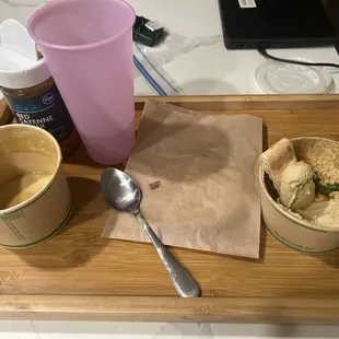 Lentil soup and fresh hummus, and pita bread