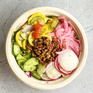 Build your own salad on the mixture of baby kale and red cabbage with three selected toppings and mustard vinaigrette.