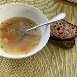 Chicken Bone Broth Soup and side of Acme sourdough bread.
