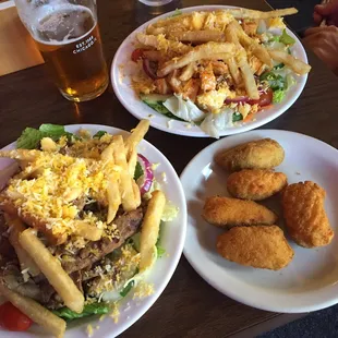 Yinzer salads with steak and buffalo chicken. Jalapeño poppers.