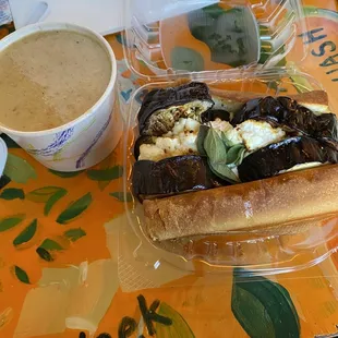 Eggplant and goat cheese sandwich with artichoke, asiago and vermouth soup