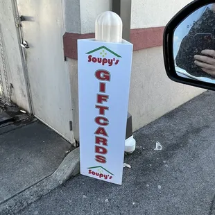 a sign on the side of a building