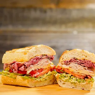 a roast beef sandwich cut in half