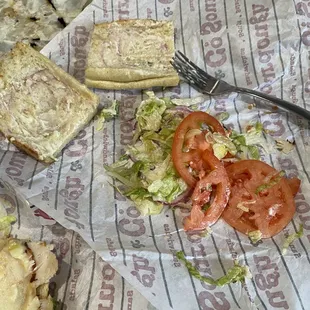 The sandwich that WASN'T suppose to have tomatoes, lettuce, or onions