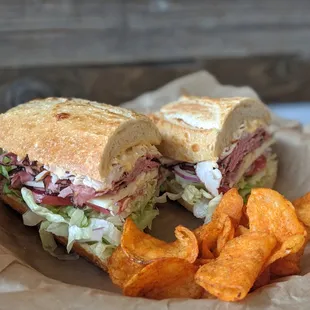 a roast beef sandwich and potato chips