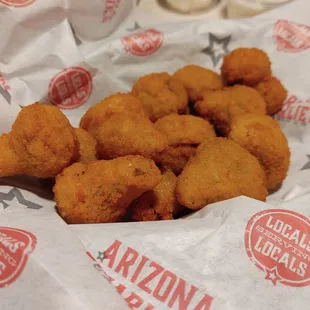 a basket of fried chicken nuggies