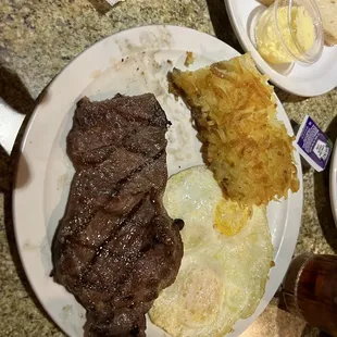 6oz. New York , Hash Browns &amp; 2 eggs over medium Sourdough toast for $9.99. A good breakfast!