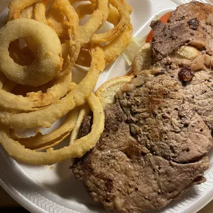 Steak sandwich and onion rings