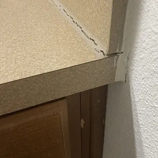 Cracked counter top in guest bathroom.