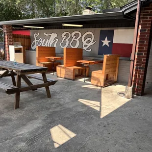 a picnic table and benches