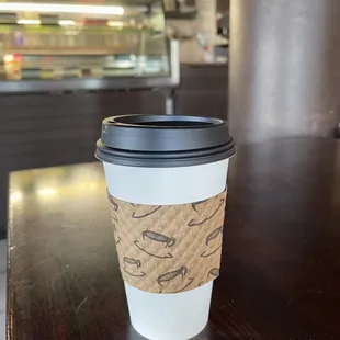 a cup of coffee on a table