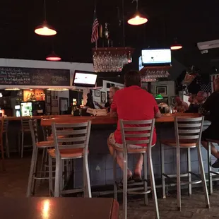 people sitting at the bar