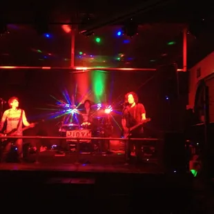 a band performing on stage