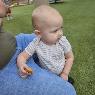 Riley having a late lunch and playtime