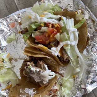 Carnitas tacos loaded with meat. Yum!