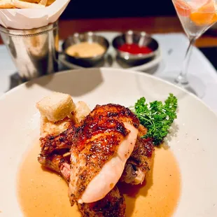 a plate of food and a glass of wine