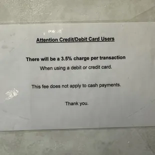 3.5% credit card fee sign.