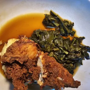 fried chicken with collard greens and mashed potatoes