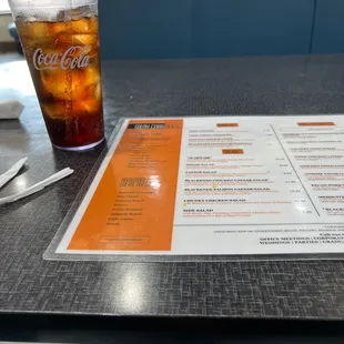 Having an ice cold Coke while taking a look at the menu options!