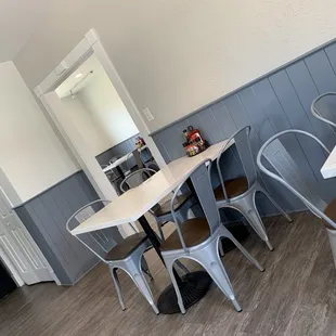 a table and chairs in a restaurant