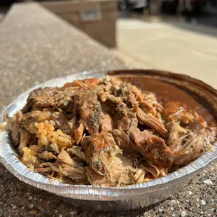 Rice, beans, pulled pork.