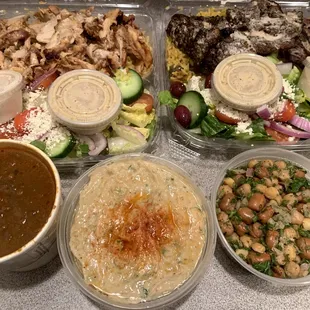 Chicken shawarma combo plate, lamb shish kabob combo place, lentil soup, babaghanoush, fava beans