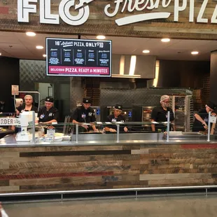 ows customers ordering pizza