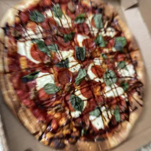 Margarita pizza - with pepperoni and sausage with a drizzle of balsamic.