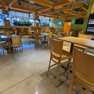 Dining tables by South Flo inside H-E-B