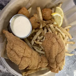 Fish Friday's. We now serve it with cole slaw, hand-cut fries, huspuppies and home made tarter sauce