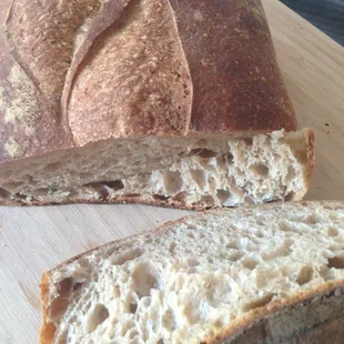 a loaf of bread on a cutting board