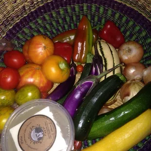 a variety of vegetables in a basket