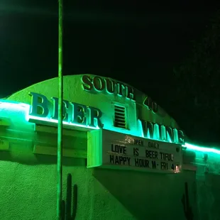 a neon sign for a bar