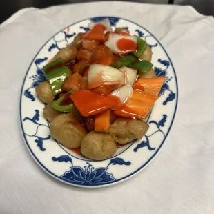 a plate of stir fried vegetables
