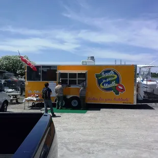 a food truck parked in a parking lot