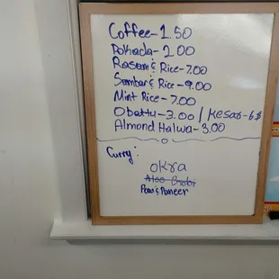 The dry erase board.