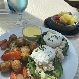 Crab Benedict roasted potatoes with side of fruit