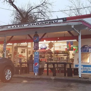 a car parked in front of the store