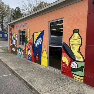 a colorful mural on the side of a building