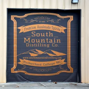 Logo to right of entrance