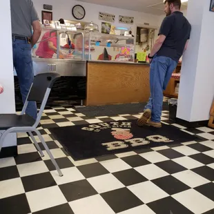 a black and white checkered floor