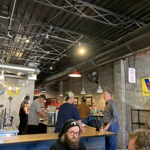 a group of people in a restaurant