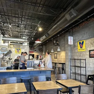 a restaurant with tables and chairs