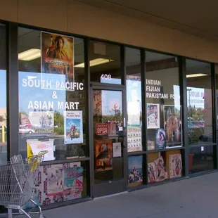 a shopping cart in front of the store
