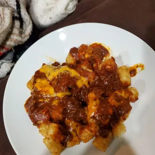 Loaded tater tots. Add extra cheese to gave both shredded and nacho