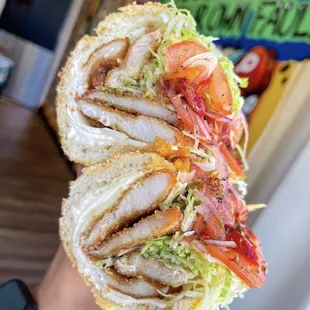 Chicken cutlet hoagie with breaded chicken cutlet, your choice of cheese, lettuce, tomato, raw onion, Mayo oil vinegar