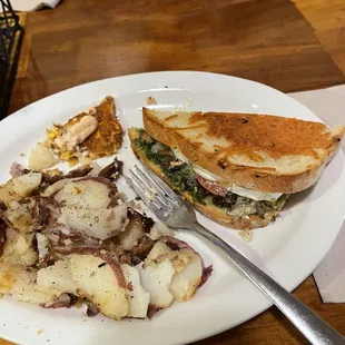 Brie, mushroom and pesto grilled cheese on sourdough. Best I have ever had!