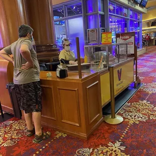 a man standing at the counter