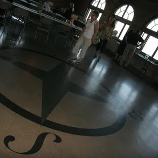 The compass rose on the floor