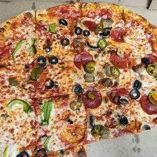 pepperoni, olives, and cheese pizza